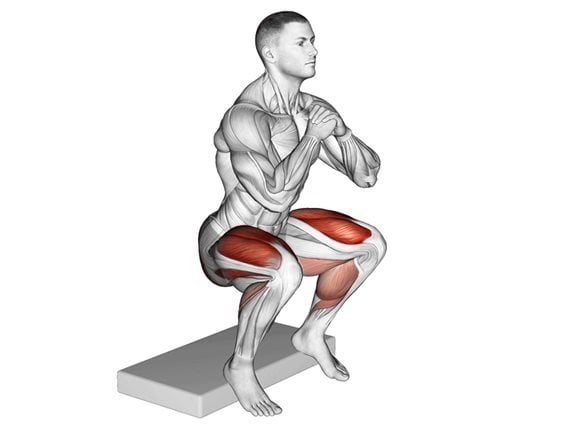 Przysiad z piętami na podwyższeniu - Bodyweight Heel Elevated Squat